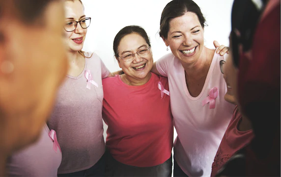 Happy women grouping together 